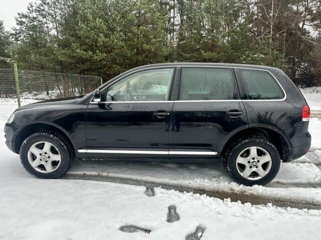 Черный Фольксваген Туарег, объемом двигателя 3 л и пробегом 295 тыс. км за 3636 $, фото 4 на Automoto.ua