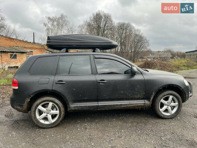 Чорний Фольксваген Туарег, об'ємом двигуна 3 л та пробігом 496 тис. км за 4200 $, фото 5 на Automoto.ua