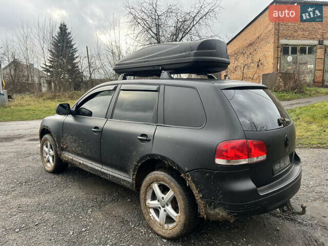 Чорний Фольксваген Туарег, об'ємом двигуна 3 л та пробігом 496 тис. км за 4200 $, фото 2 на Automoto.ua