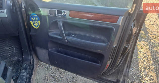 Черный Фольксваген Туарег, объемом двигателя 4.92 л и пробегом 210 тыс. км за 2999 $, фото 3 на Automoto.ua