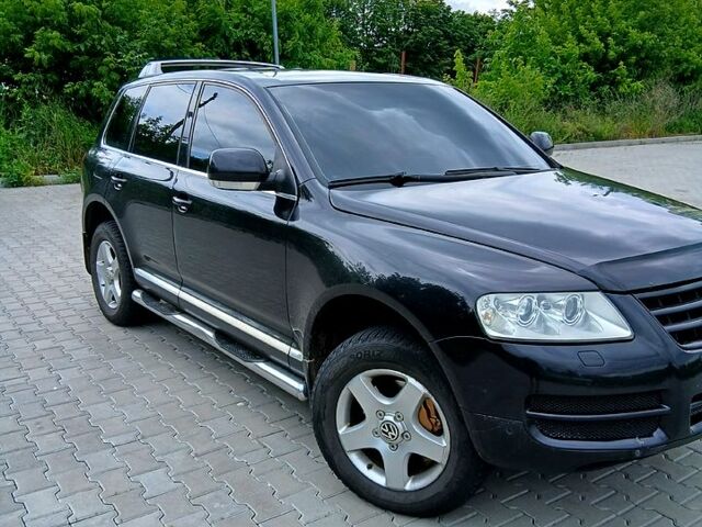 Черный Фольксваген Туарег, объемом двигателя 3.2 л и пробегом 303 тыс. км за 8950 $, фото 2 на Automoto.ua