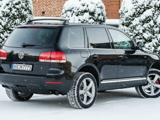 Черный Фольксваген Туарег, объемом двигателя 3 л и пробегом 266 тыс. км за 4350 $, фото 7 на Automoto.ua