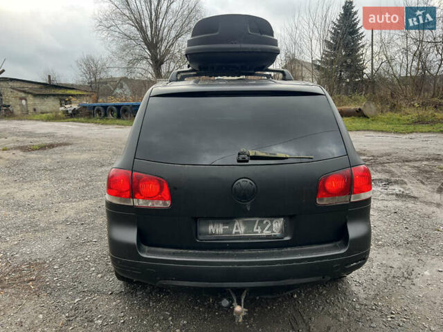 Чорний Фольксваген Туарег, об'ємом двигуна 3 л та пробігом 496 тис. км за 4200 $, фото 3 на Automoto.ua