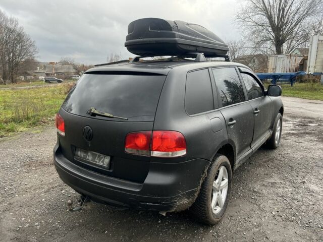 Чорний Фольксваген Туарег, об'ємом двигуна 3 л та пробігом 496 тис. км за 4250 $, фото 5 на Automoto.ua