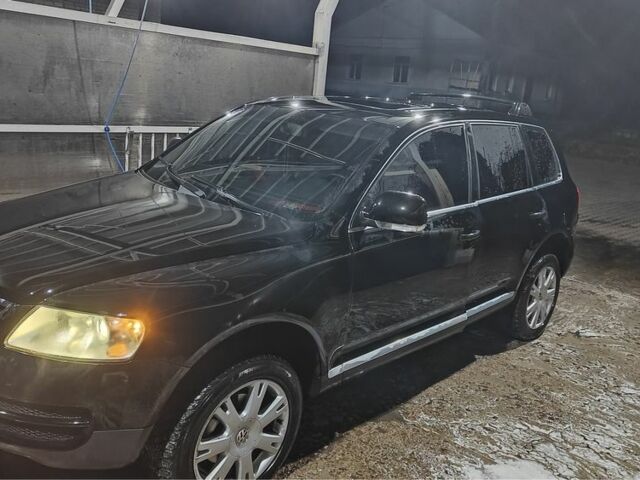 Черный Фольксваген Туарег, объемом двигателя 2.5 л и пробегом 345 тыс. км за 4720 $, фото 1 на Automoto.ua