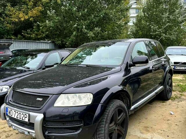 Чорний Фольксваген Туарег, об'ємом двигуна 5 л та пробігом 110 тис. км за 5000 $, фото 5 на Automoto.ua