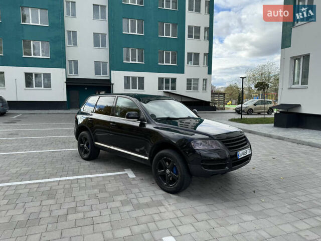 Черный Фольксваген Туарег, объемом двигателя 2.97 л и пробегом 325 тыс. км за 8850 $, фото 2 на Automoto.ua