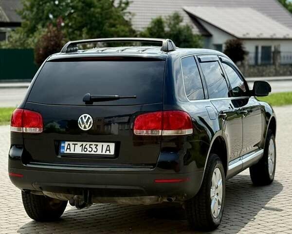 Черный Фольксваген Туарег, объемом двигателя 2.97 л и пробегом 260 тыс. км за 9500 $, фото 5 на Automoto.ua