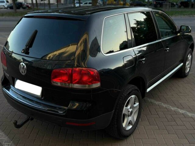 Чорний Фольксваген Туарег, об'ємом двигуна 2.5 л та пробігом 300 тис. км за 4900 $, фото 2 на Automoto.ua
