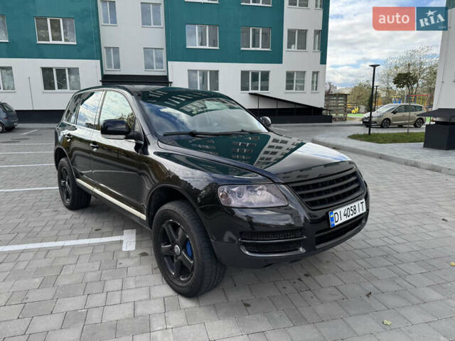 Черный Фольксваген Туарег, объемом двигателя 2.97 л и пробегом 325 тыс. км за 8850 $, фото 19 на Automoto.ua