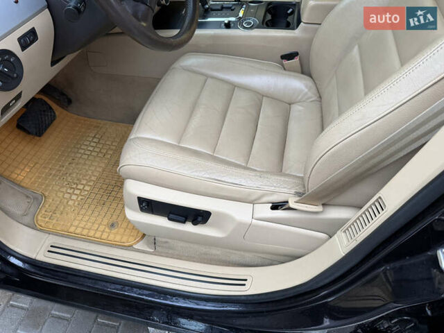 Черный Фольксваген Туарег, объемом двигателя 2.97 л и пробегом 329 тыс. км за 9500 $, фото 19 на Automoto.ua