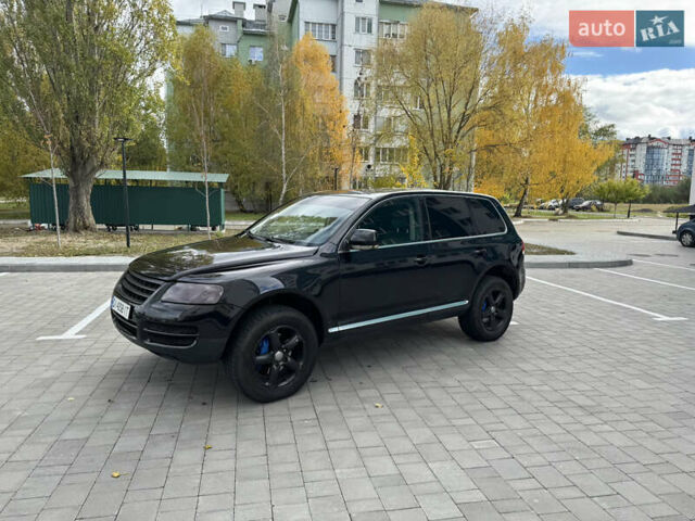 Черный Фольксваген Туарег, объемом двигателя 2.97 л и пробегом 325 тыс. км за 8850 $, фото 8 на Automoto.ua