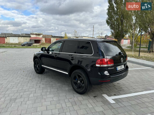 Черный Фольксваген Туарег, объемом двигателя 2.97 л и пробегом 325 тыс. км за 8850 $, фото 20 на Automoto.ua