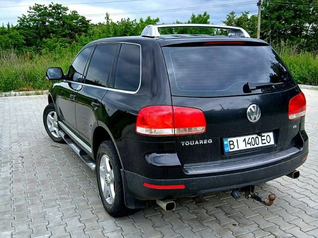 Черный Фольксваген Туарег, объемом двигателя 3.2 л и пробегом 303 тыс. км за 8950 $, фото 3 на Automoto.ua
