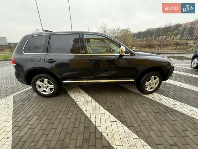 Черный Фольксваген Туарег, объемом двигателя 2.97 л и пробегом 329 тыс. км за 9500 $, фото 5 на Automoto.ua