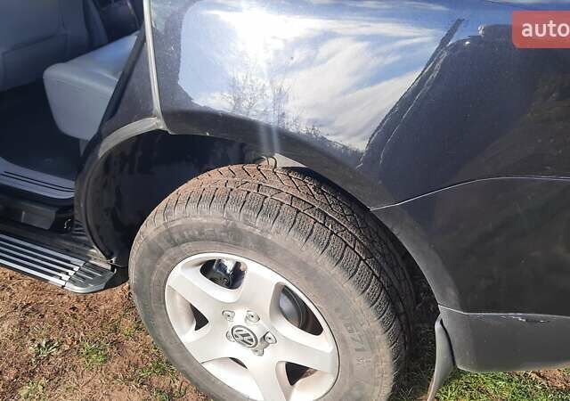 Черный Фольксваген Туарег, объемом двигателя 2.46 л и пробегом 245 тыс. км за 8500 $, фото 6 на Automoto.ua