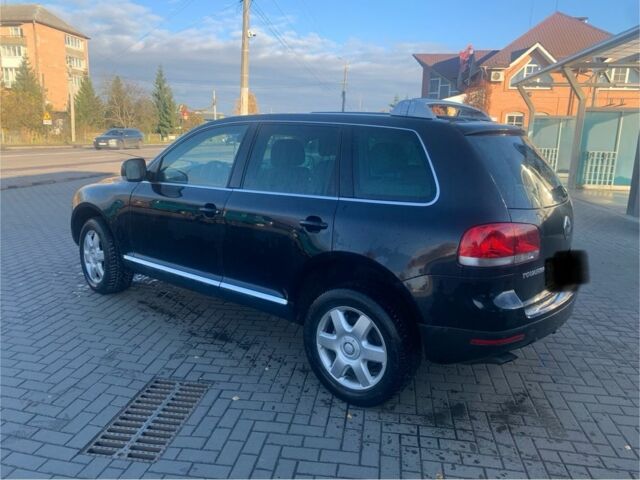 Чорний Фольксваген Туарег, об'ємом двигуна 5 л та пробігом 370 тис. км за 4200 $, фото 6 на Automoto.ua