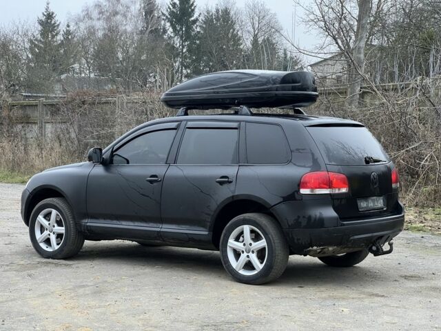 Чорний Фольксваген Туарег, об'ємом двигуна 3 л та пробігом 496 тис. км за 3999 $, фото 2 на Automoto.ua