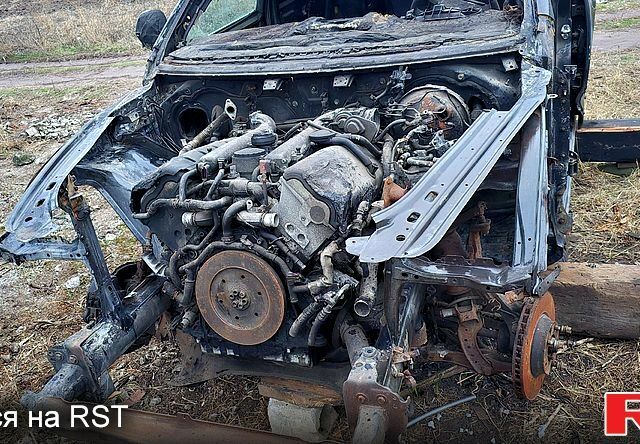 Черный Фольксваген Туарег, объемом двигателя 5 л и пробегом 200 тыс. км за 2600 $, фото 3 на Automoto.ua