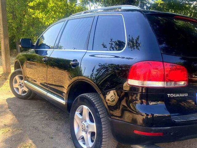 Черный Фольксваген Туарег, объемом двигателя 3 л и пробегом 380 тыс. км за 8200 $, фото 4 на Automoto.ua