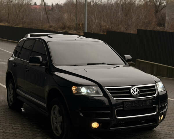 Черный Фольксваген Туарег, объемом двигателя 4.9 л и пробегом 340 тыс. км за 6900 $, фото 92 на Automoto.ua