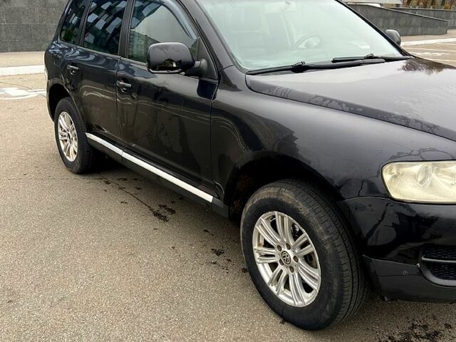 Чорний Фольксваген Туарег, об'ємом двигуна 2.5 л та пробігом 0 тис. км за 5000 $, фото 1 на Automoto.ua