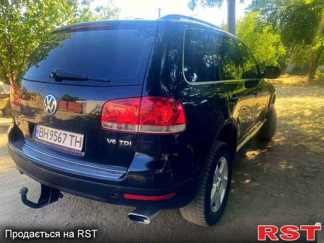 Черный Фольксваген Туарег, объемом двигателя 3 л и пробегом 380 тыс. км за 8200 $, фото 1 на Automoto.ua