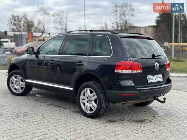 Черный Фольксваген Туарег, объемом двигателя 2.97 л и пробегом 421 тыс. км за 8000 $, фото 2 на Automoto.ua