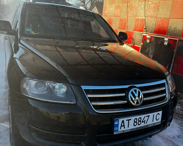Черный Фольксваген Туарег, объемом двигателя 2.46 л и пробегом 325 тыс. км за 8700 $, фото 6 на Automoto.ua