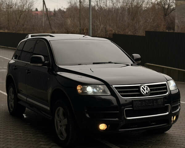 Черный Фольксваген Туарег, объемом двигателя 4.9 л и пробегом 340 тыс. км за 6900 $, фото 93 на Automoto.ua