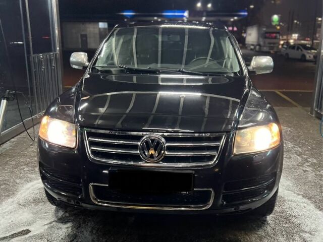 Чорний Фольксваген Туарег, об'ємом двигуна 3 л та пробігом 450 тис. км за 4950 $, фото 5 на Automoto.ua