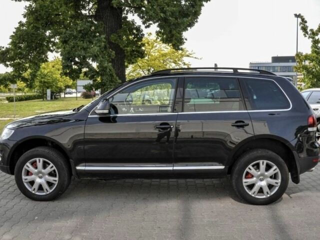 Черный Фольксваген Туарег, объемом двигателя 3 л и пробегом 215 тыс. км за 3333 $, фото 2 на Automoto.ua