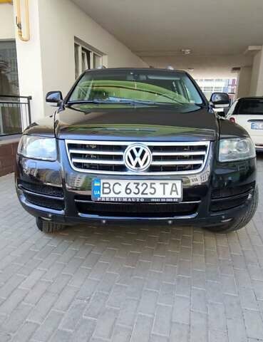 Чорний Фольксваген Туарег, об'ємом двигуна 3 л та пробігом 365 тис. км за 10700 $, фото 2 на Automoto.ua