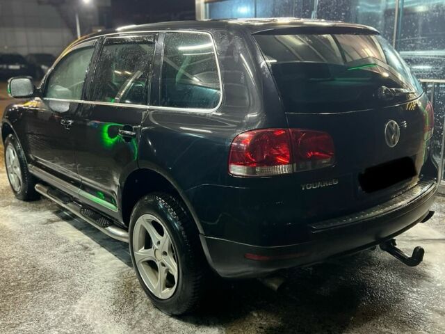 Чорний Фольксваген Туарег, об'ємом двигуна 3 л та пробігом 450 тис. км за 4950 $, фото 9 на Automoto.ua