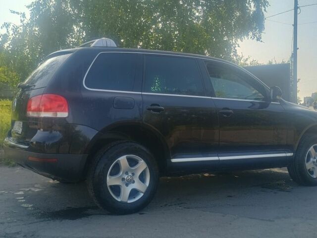 Черный Фольксваген Туарег, объемом двигателя 2.5 л и пробегом 271 тыс. км за 6000 $, фото 2 на Automoto.ua