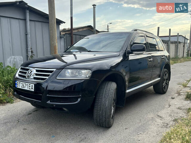 Чорний Фольксваген Туарег, об'ємом двигуна 3 л та пробігом 230 тис. км за 14000 $, фото 3 на Automoto.ua