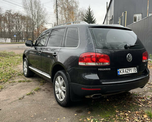 Черный Фольксваген Туарег, объемом двигателя 2.97 л и пробегом 301 тыс. км за 8950 $, фото 4 на Automoto.ua