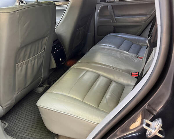 Чорний Фольксваген Туарег, об'ємом двигуна 3 л та пробігом 280 тис. км за 11000 $, фото 6 на Automoto.ua