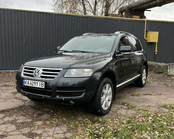 Черный Фольксваген Туарег, объемом двигателя 2.97 л и пробегом 301 тыс. км за 8950 $, фото 6 на Automoto.ua