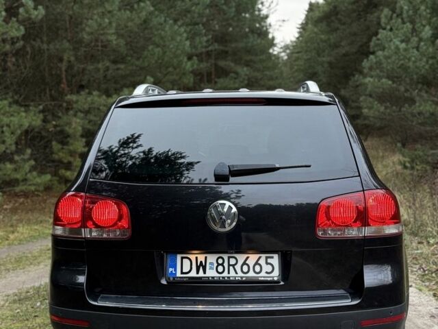 Чорний Фольксваген Туарег, об'ємом двигуна 3 л та пробігом 272 тис. км за 6500 $, фото 4 на Automoto.ua