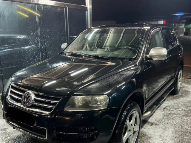 Чорний Фольксваген Туарег, об'ємом двигуна 3 л та пробігом 450 тис. км за 4950 $, фото 1 на Automoto.ua