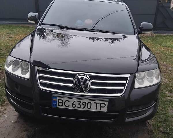 Чорний Фольксваген Туарег, об'ємом двигуна 3 л та пробігом 318 тис. км за 9200 $, фото 1 на Automoto.ua