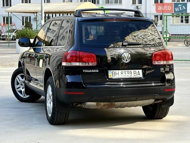 Черный Фольксваген Туарег, объемом двигателя 3.2 л и пробегом 165 тыс. км за 9999 $, фото 6 на Automoto.ua