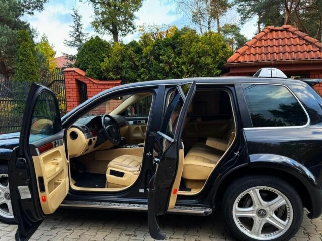 Черный Фольксваген Туарег, объемом двигателя 3 л и пробегом 280 тыс. км за 3100 $, фото 1 на Automoto.ua