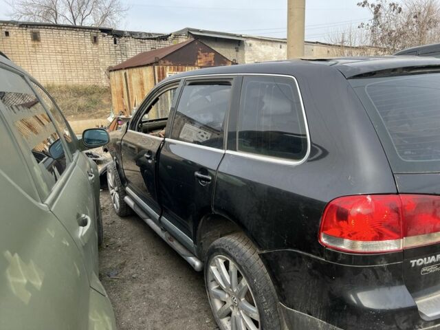 Чорний Фольксваген Туарег, об'ємом двигуна 3 л та пробігом 127 тис. км за 1599 $, фото 2 на Automoto.ua