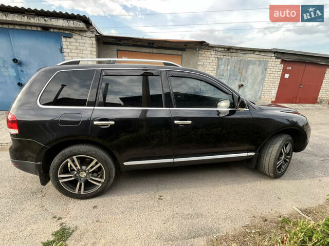 Чорний Фольксваген Туарег, об'ємом двигуна 3 л та пробігом 230 тис. км за 14000 $, фото 11 на Automoto.ua