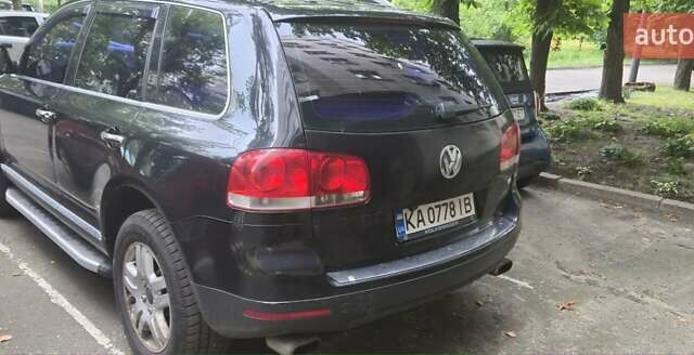 Черный Фольксваген Туарег, объемом двигателя 3.2 л и пробегом 360 тыс. км за 9500 $, фото 4 на Automoto.ua