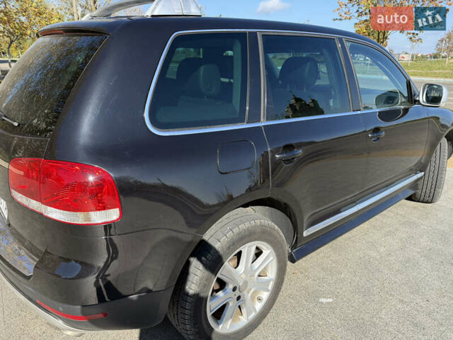 Черный Фольксваген Туарег, объемом двигателя 3 л и пробегом 340 тыс. км за 7500 $, фото 2 на Automoto.ua