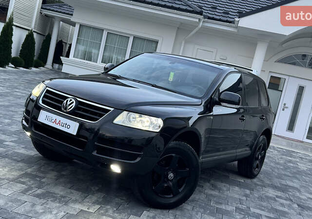 Чорний Фольксваген Туарег, об'ємом двигуна 2.5 л та пробігом 176 тис. км за 9950 $, фото 4 на Automoto.ua