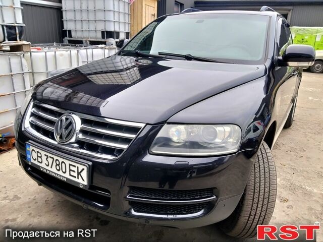 Чорний Фольксваген Туарег, об'ємом двигуна 3 л та пробігом 307 тис. км за 9350 $, фото 1 на Automoto.ua